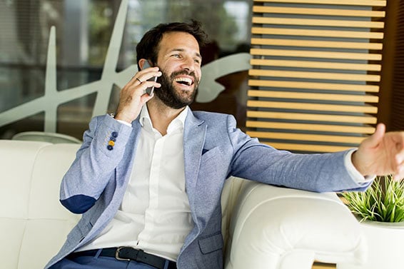 Handsome businessman talking over the mobile phone